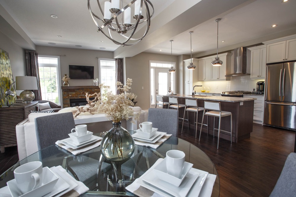 Open-plan living, dining and kitchen interior at Village on the Grand